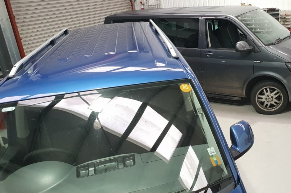 image of two cars in our workshop